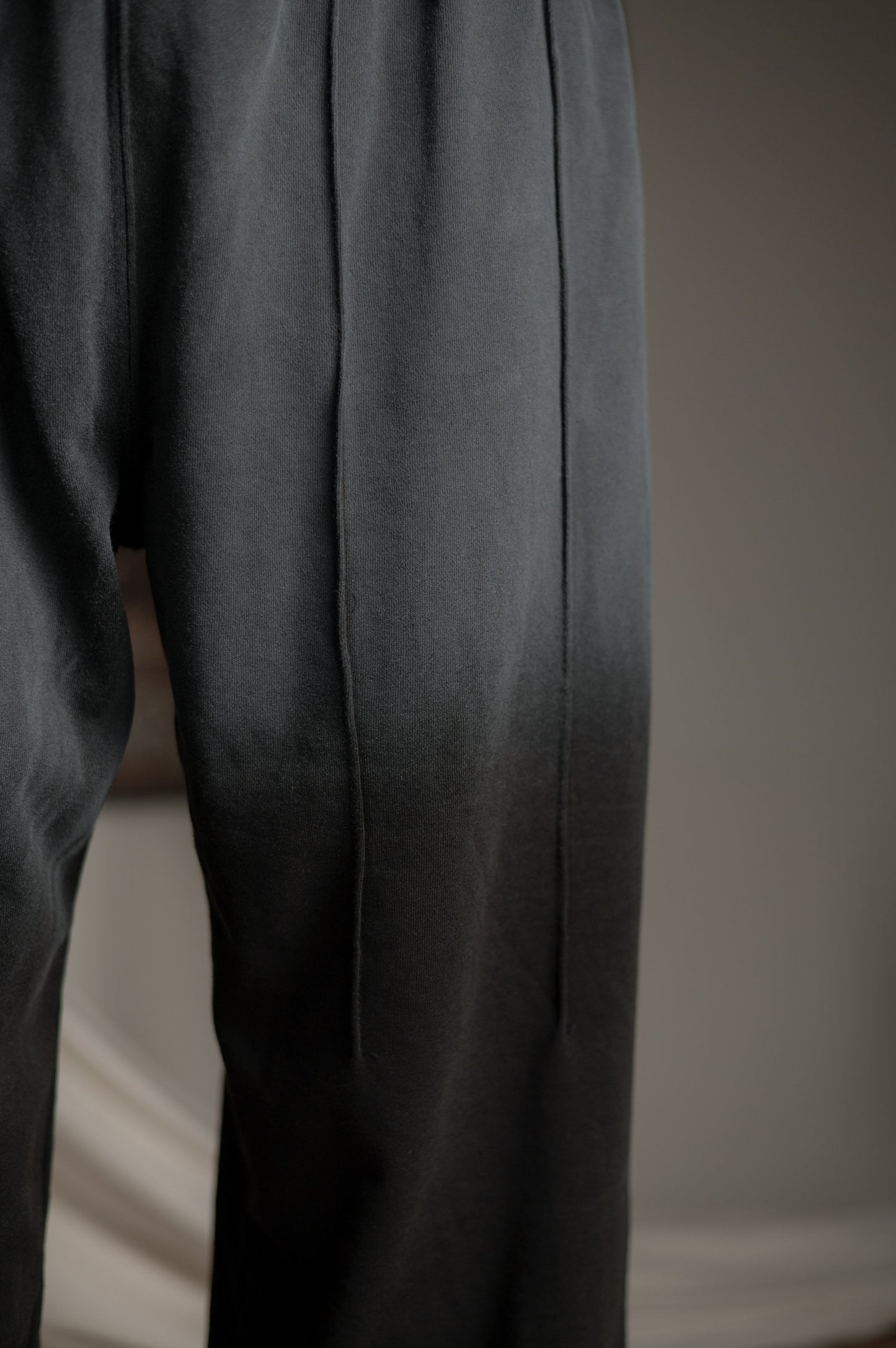 BLACK SUNFADE PLEATED TROUSER