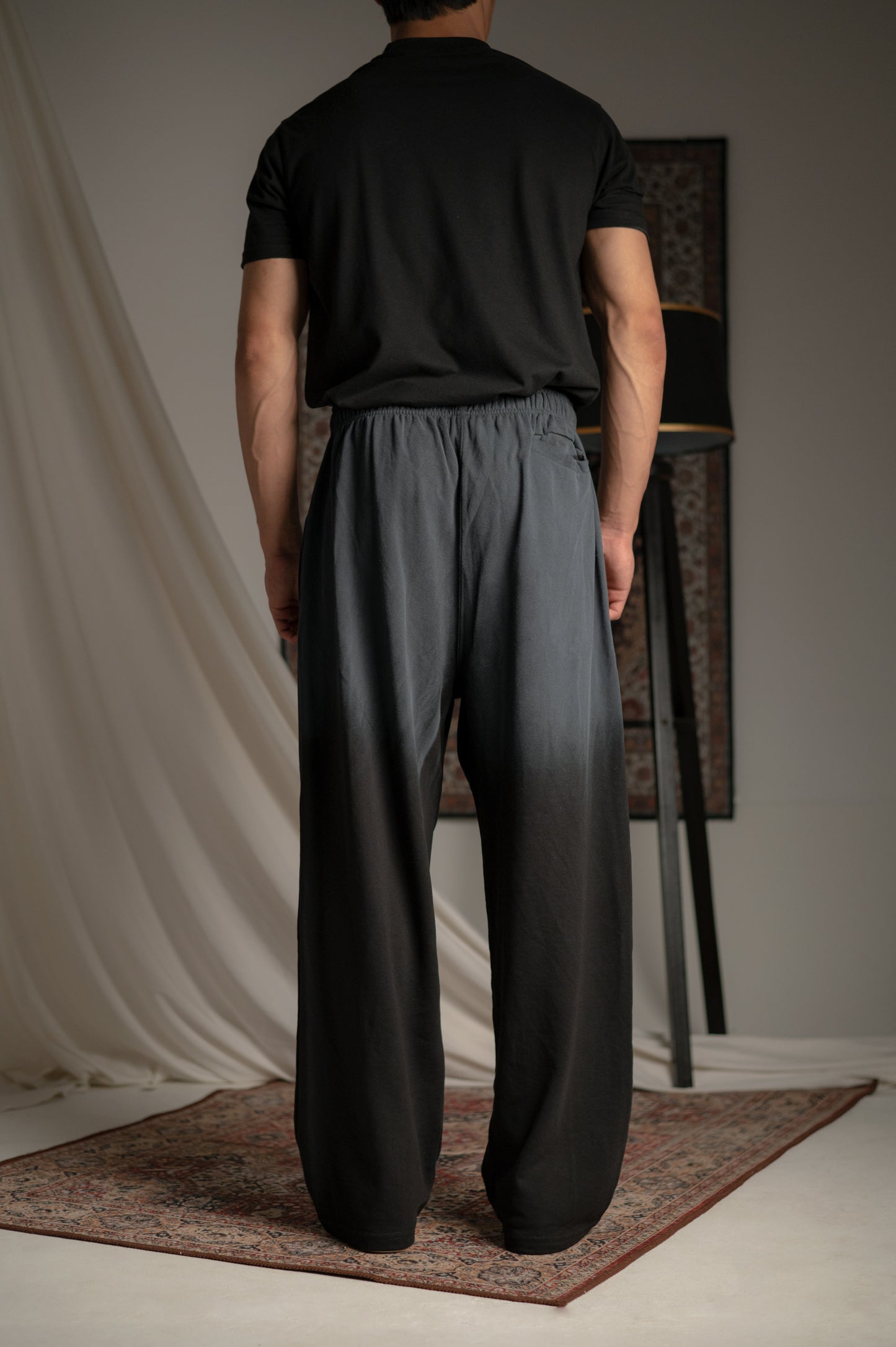 BLACK SUNFADE PLEATED TROUSER